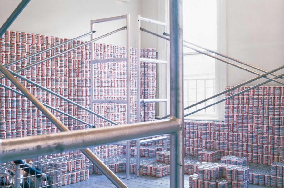 Cady Noland, This Piece Has No Title Yet (detail), 1989, installation with beer cans, flags, steel scafolding, paint and mixed media